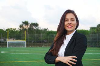 Jessi Melton on the football field in Boca Raton, FL