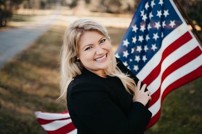 Kat Cammack with American Flag in Republican Magazine