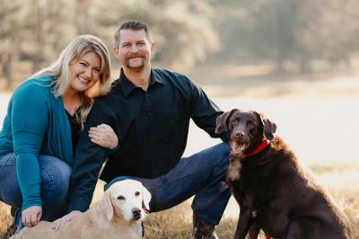 Kat Cammack and Matt Harrison with their dogs - Republican Magazine Interview